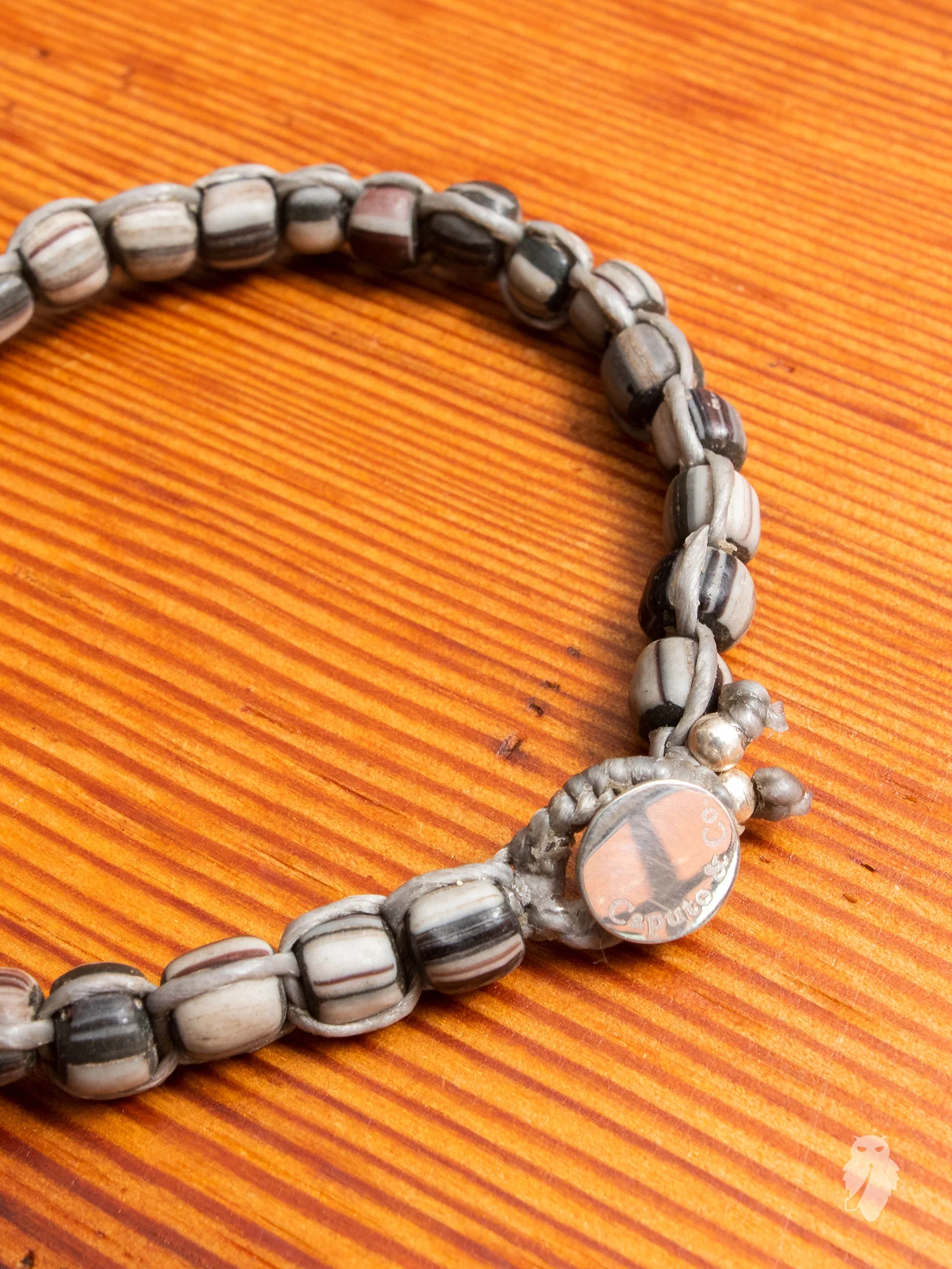 Handwoven Recycled Glass Beads in Dark Grey Stripe - Image 2